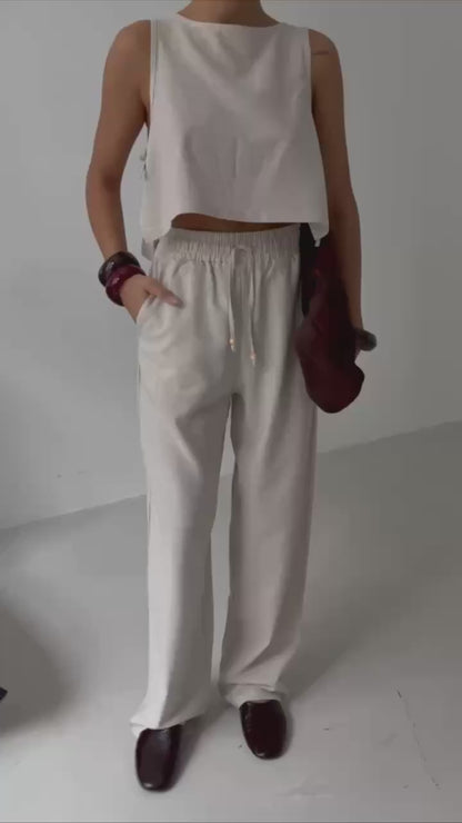 Crop top and straight cut trousers set